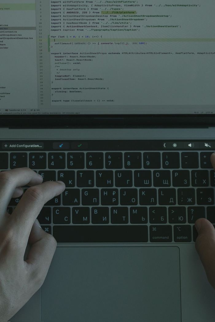 Computing & IT student writing code